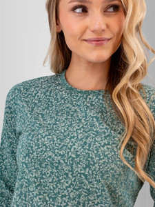 Front chest detail view of the Tatum Organic Cotton Floral Long Sleeve Top in green.