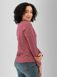 Right rear shoulder detail view of the Tatum Organic Cotton Floral Long Sleeve Top in wild ginger purple.