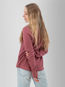 Left rear shoulder view of the Cascade 1/4 Zip Striped Pullover in wild ginger purple.