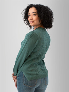 Left back view of the Winter Wisteria Embroidered Cable Knit Sweater in sea pine green.