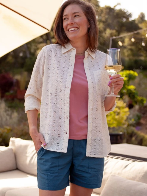 Woman sting outside with wine wearing Harris Cotton Ripstop Short in Mallard Blue