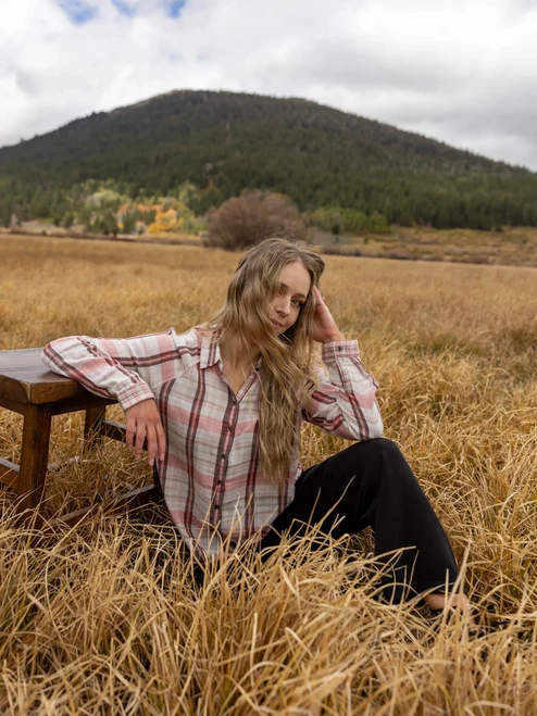 Woman wearing Lark Raglan Contrast Plaid Top studio