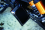 Kuryakyn Nova Curved Vertical Mount Side License Plate Holder Gloss Black - Model 3191