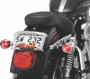 Kuryakyn Deep Dish Bezel with Red Lens for Harley-Davidson Bullet Turn Signals – Part 2109