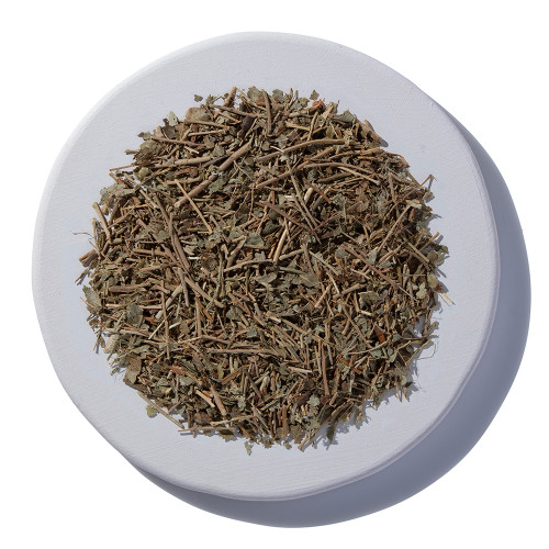 Bilberry Leaf Cut and Sift Organic on a white plate