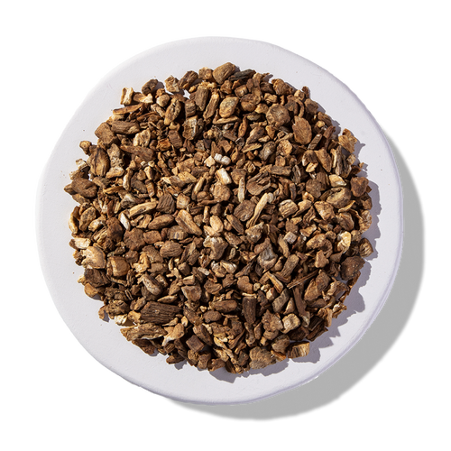 Organic Burdock Root Cut and Sift on a white plate