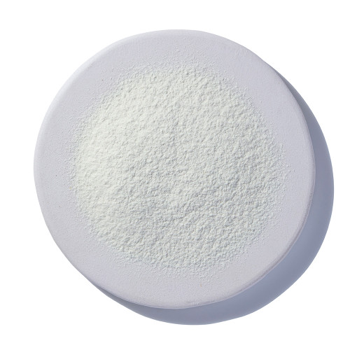 Guar Gum Powder Organic on white plate
