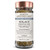 An ultra-high-resolution, front-facing studio product photograph of a clear glass spice jar against a clean white background.  The jar features a premium copper-colored metallic lid and a minimalist cream-colored label with black and slate-blue typography. The brand name "POETIC APOTHECARY™" is displayed at the top, followed by the product name "SOLACE" and the functional benefit "DIGESTIVE EASE." The label includes detailed sections for "FLAVOR EXPERIENCE," describing a blend of mint, citrus, ginger, and fennel, and a "TERPENES" section listing Zingiberene, Citral, and Menthol. The visible contents inside the jar consist of a textured, bulk-grade botanical blend featuring green dried leaf fragments and golden-brown herbal pieces. The lighting is soft and even, casting a gentle shadow at the base of the jar, emphasizing a clean, high-end apothecary aesthetic.