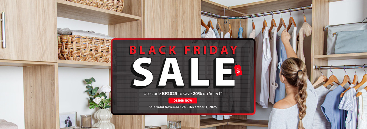 Organized Living Blonde Oak Select walk-in closet filled with clothing and home items. A person reaches for a hanging shirt. A Black Friday Sale banner reads ‘Use code BF2025 to save 20% on Select.’ A red ‘Design Now’ button is shown. Sale dates: November