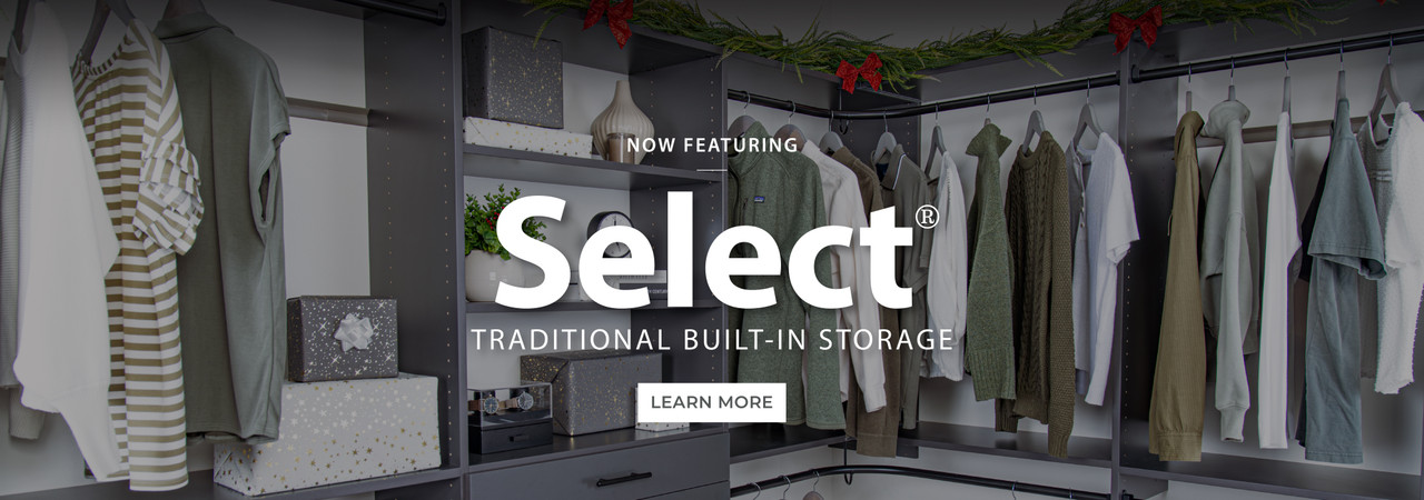 Organized Living Slate Select closet decorated with clothing and garland topped with red bows. White text reads ‘Now Featuring Select Traditional Built-In Storage,’ with a ‘Learn More’ button displayed.
