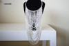 African inspired infinity fringe necklace white