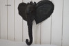 Elephant head carving with trunk