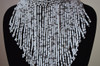 African inspired white fringe necklace short