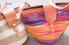 African sisal and leather handbag handwoven yellow red blue