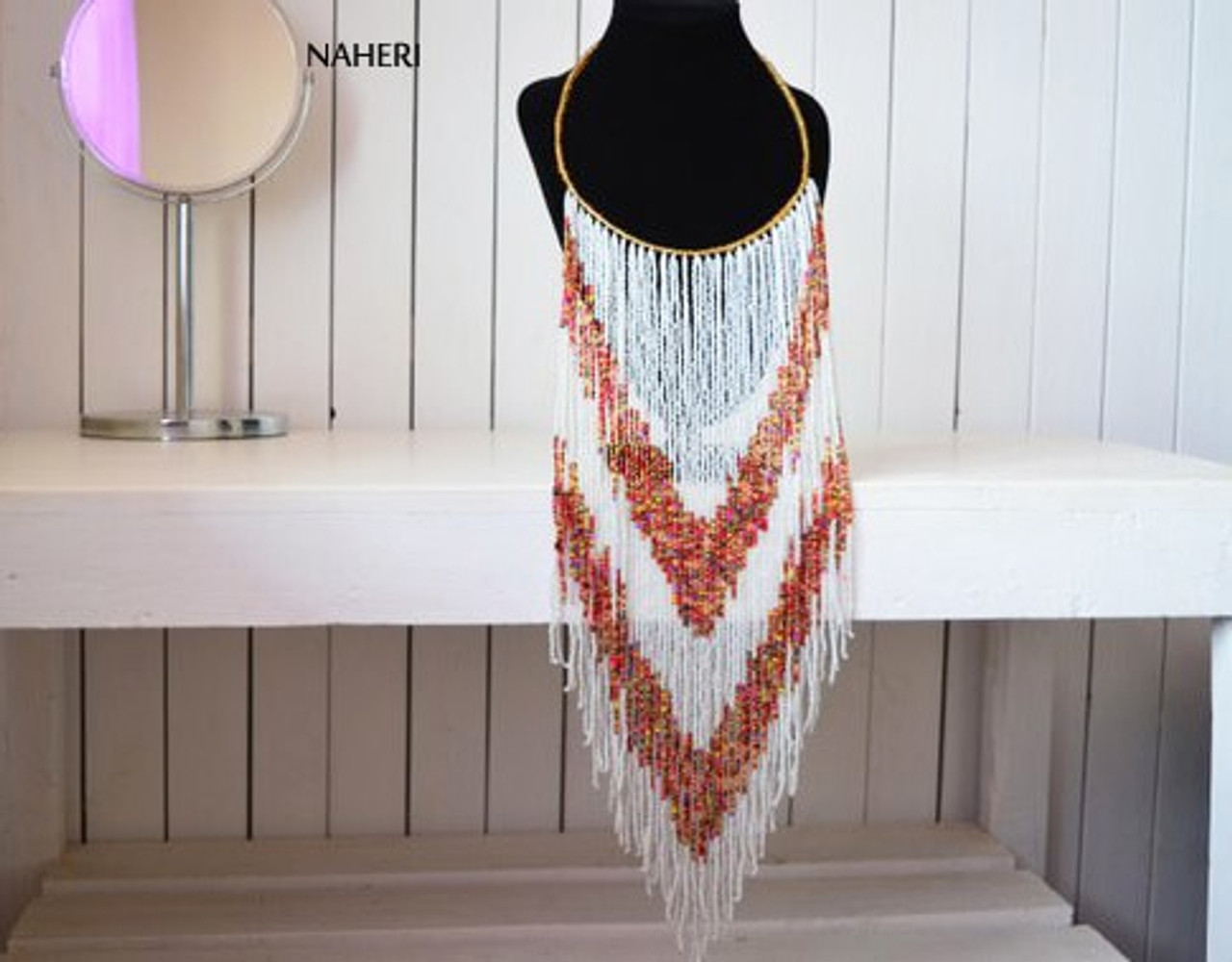 Long white store tassel necklace