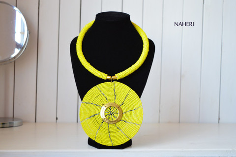 African beaded necklace yellow round pendant