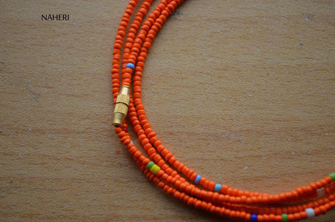 African dark orange with mixed color waist beads