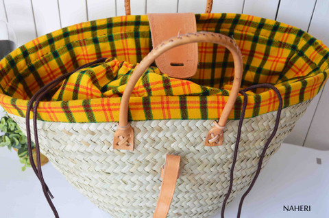 African natural basket with plaid maasai shuka