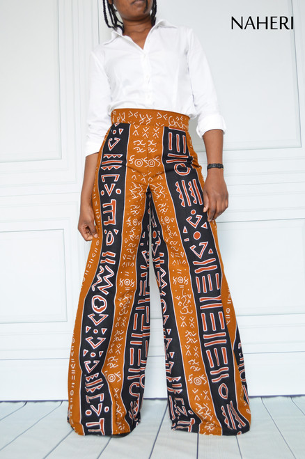 45 Ways African Women Are Rocking Ankara Palazzo Trousers With Tops | African  print pants, African print fashion, African women