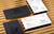 32pt Suede Laminated Business Cards with Gold Foil Stamp and Spot UV Lamination and Black Colored Edges