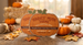 Die cut flyer shaped like a pumpkin for Harvest Moon Farms' fall festival, promoting the pumpkin patch, corn maze, and hayrides, styled among hay bales, gourds, and autumn leaves — custom die cut flyer example