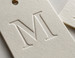 Embossed bookmark featuring 01 custom ivory deep blind monogram | printshaQ