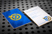 Embossed Business Card printed on a 45pt Cotton Stock with Debossing and a Blue Foil Stamp Gold Foil Stamp and Colored Edges