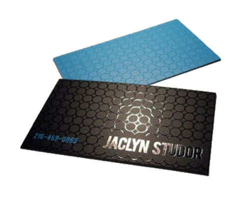 Modern black matte business card featuring vibrant metallic blue edge painted accents, high-gloss geometric honeycomb spot UV overlay, and raised tactile lettering.