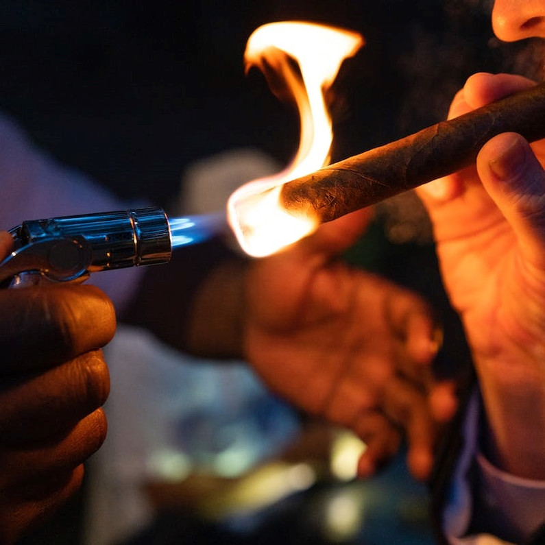 How to Light a Cigar With a Torch Lighter