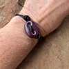 Casual and sporty cremation ash bracelet shown with a purple Sisu Bead.