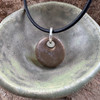 Chocolate brown Phoenix cremation ash bead. Matte glaze.