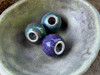 Green, Blue and Purple cremation ash beads.