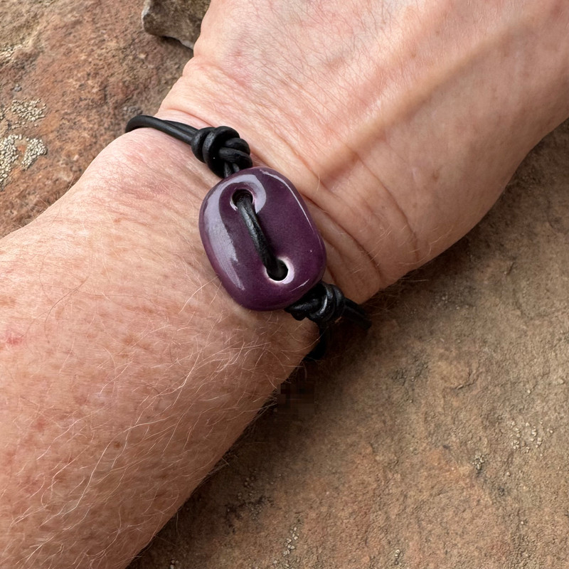 Casual and sporty cremation ash bracelet shown with a purple Sisu Bead.