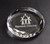 round crystal paperweight engraved with text and logo