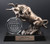Bronze Bull award charging over the thick round crystal personalized with your logo and text to recognize employees