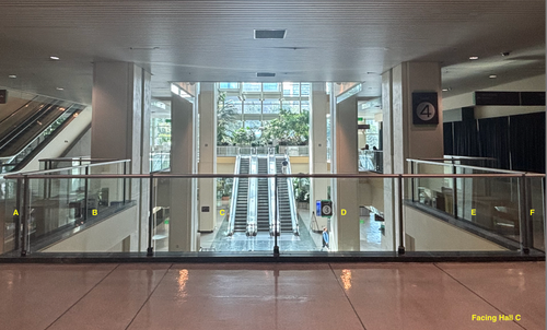 Glass Cling by the Elevator 4 Escalator Landings 