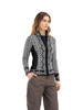 Dale of Norway - Christiania Women's Cardigan: Black/Off White, 81951-F_Model side
Photo Credits: Dale of Norway
light weight mid-layer with full length 2-way zipper and high neck. intricate design elements and decorative embellishments throughout. 