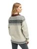 Dale of Norway - Setesdal Unisex Sweater: Off White/Black, 93781-A_Female model back
Photo credits: Dale of Norway
Norwegian wool sweater with traditional braid, Norwegian pewter clasps and lusemønster pattern.