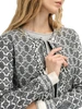 Dale of Norway - Ingeborg Women's Cardigan: Off White/Black, 83521-A00_pattern detail
Photo credits: Dale of Norway
Lightweight mid-layer with long length, crewneck, and 2-way zipper front. All-over design with pattern shifts at the waist.