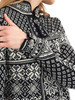 Dale of Norway - Peace Women's 1/4 Zip Sweater: Black/Off White, 13312-F00_Sleeve pattern and pewter button detail
Photo: Dale of Norway
Medium weight mid-layer with all-over pattern and medium high neck. Designed for the 2006 Turin Winter Olympics