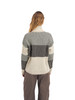 Dale of Norway - Skarstind Women's Sweater: Sand/Black/Off White, 95661-A00_Model back
Photo credits: Dale of Norway
A medium weight mid layer sweater with a loose fit and high neck. Textured knit pattern, with a natural tonal color palette.
