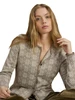 Dale of Norway - Othelie Women's Cardigan: Mountainstone/Off White, 85681-P00_Model front detail
Photo credits: Dale of Norway
A lightweight mid-layer with a slim fit, a button-front closure, crew neckline, and an all-over eight-petal rose pattern