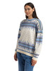 Dale of Norway - Albertville Women's Sweater: Off White/Blue Shadow/Ice Blue, 96321-A00_model left side
Photo credits: Dale of Norway
Featuring an authentic Norwegian Olympic-inspired pattern, heavy knit 100% wool construction, relaxed fit, crew neck, and premium Scandinavian craftsmanship designed and knitted in Norway.