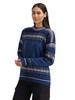 Dale of Norway - Albertville Women's Sweater: Indigo/Navy/Light Purple, 96321-C00_Model left side
Photo credits: Dale of Norway
Featuring an authentic Norwegian Olympic-inspired pattern, heavy knit 100% wool construction, relaxed fit, crew neck, and premium Scandinavian craftsmanship designed and knitted in Norway.