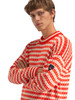 Dale of Norway - Skipsleia Unisex Crewneck Sweater: Orange (Roth Red)/Natural White, 96151-K00_masculine model side
Photo credits: Dale of Norway