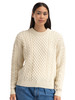 Dale of Norway - Stalheim Women's Sweater: Natural White, 96461-M00_model front detail
A chunky knit undyed Norwegian wool sweater with cable knit, moss stitch, and honeycomb pattern textures.
Photo Credits: Dale of Norway