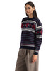 Dale of Norway - Egersund Women's Sweater: Navy/Off White/Red Rose, 96381-C00_Model left side
Norwegian wool holiday sweater with traditional Nordic pattern and crew neck.
Photo credits: Dale of Norway