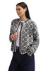 Dale of Norway - Sotra Alpa Women's Cardigan: Black/Off White, 85921-F00_Model left side
Photo credits: Dale of Norway
Featuring traditional Sotra rose pattern, button-front closure, relaxed fit, alpaca and Norwegian wool blend, and authentic Scandinavian knitwear craftsmanship.
