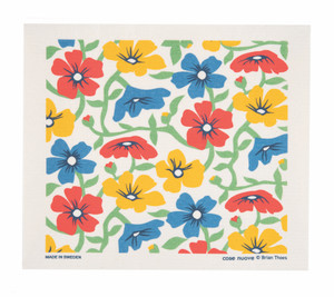 Swedish Drying Mat - Flower Festival (220.16) 
Photo credits: Cose Nuove
Drying mat with a botanical pattern of flowers printed in primary colors of Blue, red, and yellow, with green leaves.
