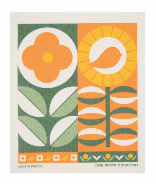 Swedish Dishcloth - Flower Stand - Green/Orange (223.12). Photo credits: Cose Nuove. 
Botanical design dishcloth containing an image of two graphic flowers in contrasting geometric styles with a color pallete of greens, oranges, and yellows